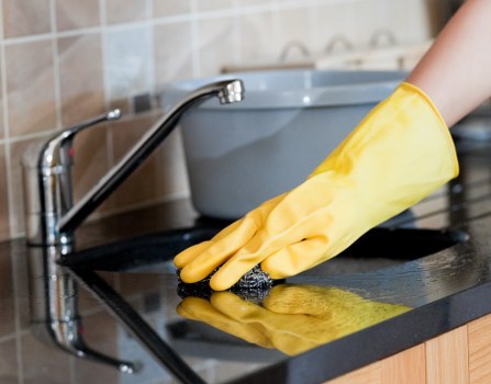 Vacuuming and stain treatment during mattress cleaning